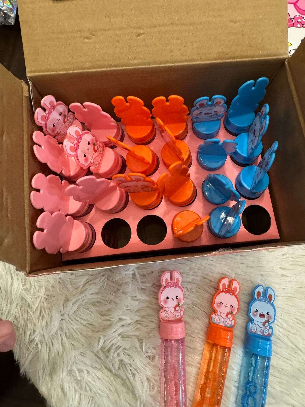 Party favor Rabbit bubbles with 24 pieces in pink, orange, and blue